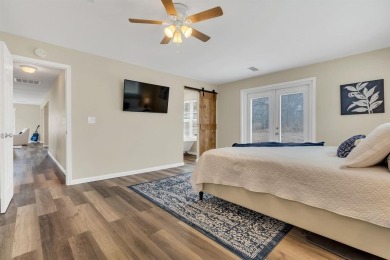 Water view home with waterfront adjacent lot in the master on Nocona Hills Golf Course in Texas - for sale on GolfHomes.com, golf home, golf lot