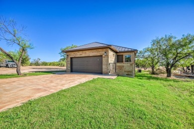 Stunning home nestled in the heart of Horseshoe Bay, Texas on Ram Rock Golf Course in Texas - for sale on GolfHomes.com, golf home, golf lot