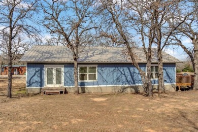 Water view home with waterfront adjacent lot in the master on Nocona Hills Golf Course in Texas - for sale on GolfHomes.com, golf home, golf lot