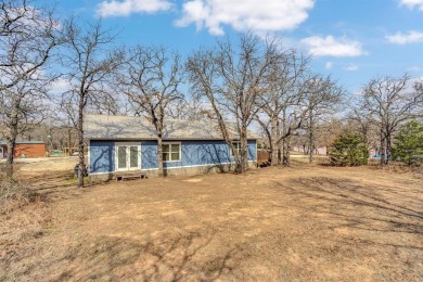 Water view home with waterfront adjacent lot in the master on Nocona Hills Golf Course in Texas - for sale on GolfHomes.com, golf home, golf lot