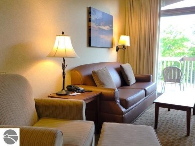 Need a place to call your own for overnight stays?  The Lodge at on Cedar River Golf Course in Michigan - for sale on GolfHomes.com, golf home, golf lot