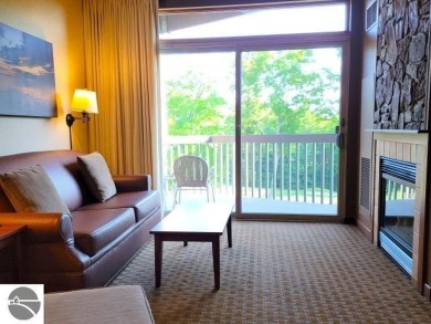 Need a place to call your own for overnight stays?  The Lodge at on Cedar River Golf Course in Michigan - for sale on GolfHomes.com, golf home, golf lot