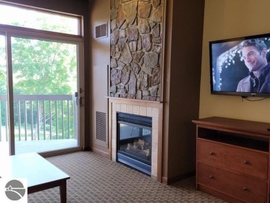 Need a place to call your own for overnight stays?  The Lodge at on Cedar River Golf Course in Michigan - for sale on GolfHomes.com, golf home, golf lot