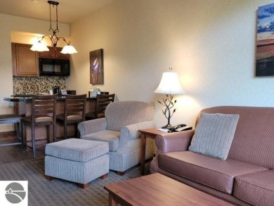 Need a place to call your own for overnight stays?  The Lodge at on Cedar River Golf Course in Michigan - for sale on GolfHomes.com, golf home, golf lot