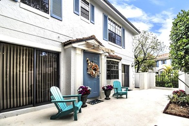 Beautifully maintained 2-story patio home in Prestwick Chase on PGA National Golf Club in Florida - for sale on GolfHomes.com, golf home, golf lot