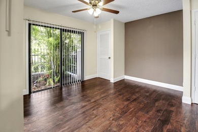 Beautifully maintained 2-story patio home in Prestwick Chase on PGA National Golf Club in Florida - for sale on GolfHomes.com, golf home, golf lot