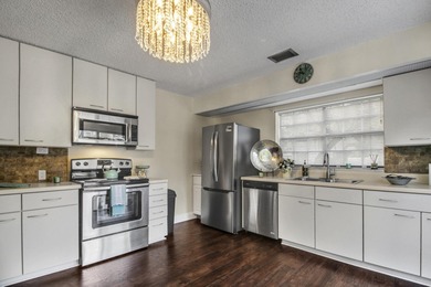 Welcome to 386-3 Prestwick Circle in Prestwick Chase, a on PGA National Golf Club in Florida - for sale on GolfHomes.com, golf home, golf lot