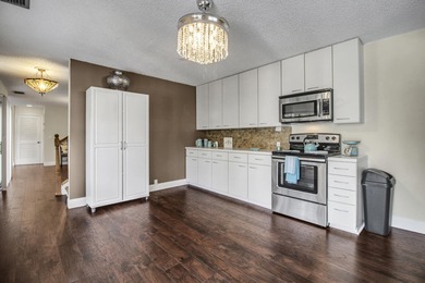 Welcome to 386-3 Prestwick Circle in Prestwick Chase, a on PGA National Golf Club in Florida - for sale on GolfHomes.com, golf home, golf lot