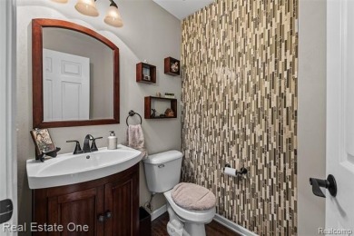 This treasured move-in ready 4-bedroom, 2.5 bathroom brick on Cracklewood Golf Club in Michigan - for sale on GolfHomes.com, golf home, golf lot