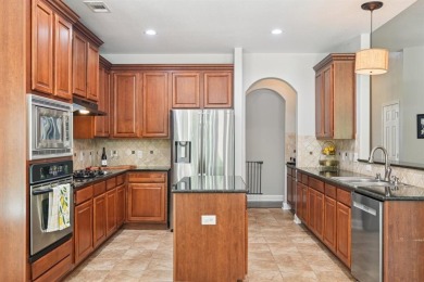 This BEAUTY is nestled on a spacious third-acre lot with a on The Shores Country Club in Texas - for sale on GolfHomes.com, golf home, golf lot