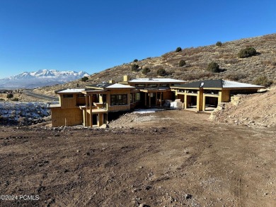 This exceptional new-construction estate, crafted for effortless on Red Ledges Golf Club in Utah - for sale on GolfHomes.com, golf home, golf lot