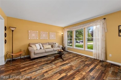 This treasured move-in ready 4-bedroom, 2.5 bathroom brick on Cracklewood Golf Club in Michigan - for sale on GolfHomes.com, golf home, golf lot