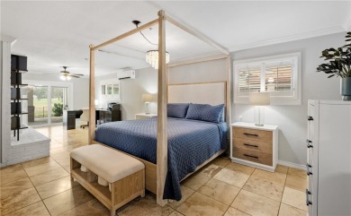 This stunning residence in Corpus Christi Country Club offers 4 on Corpus Christi Country Club Golf Course in Texas - for sale on GolfHomes.com, golf home, golf lot