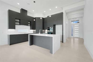 Beautiful inventory Marbella home! This 4 BR/3 BA single story on Providence Golf Club in Florida - for sale on GolfHomes.com, golf home, golf lot