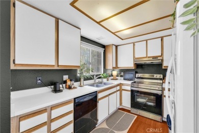 This well-maintained CORNER townhome sits in the sought-after on Tustin Ranch Golf Club in California - for sale on GolfHomes.com, golf home, golf lot