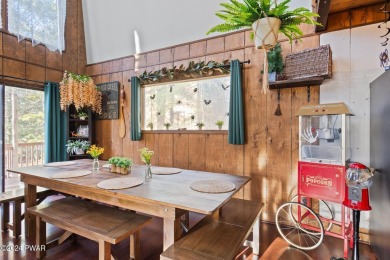 CONTEMPORARY LOG-SIDED CHALET, JUST A MINUTE OR TWO WALK TO THE on The Hideout Golf in Pennsylvania - for sale on GolfHomes.com, golf home, golf lot