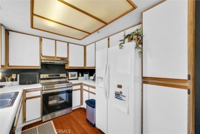 This well-maintained CORNER townhome sits in the sought-after on Tustin Ranch Golf Club in California - for sale on GolfHomes.com, golf home, golf lot