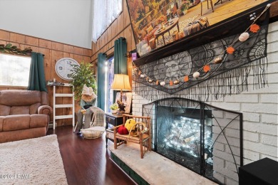CONTEMPORARY LOG-SIDED CHALET, JUST A MINUTE OR TWO WALK TO THE on The Hideout Golf in Pennsylvania - for sale on GolfHomes.com, golf home, golf lot