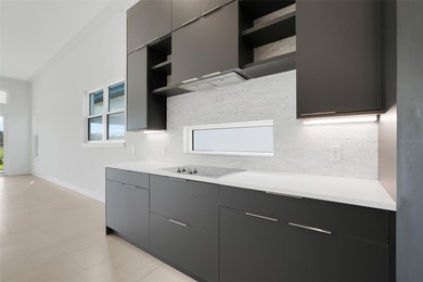 Beautiful inventory Marbella home! This 4 BR/3 BA single story on Providence Golf Club in Florida - for sale on GolfHomes.com, golf home, golf lot