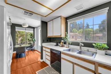This well-maintained CORNER townhome sits in the sought-after on Tustin Ranch Golf Club in California - for sale on GolfHomes.com, golf home, golf lot