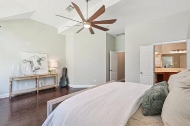 This BEAUTY is nestled on a spacious third-acre lot with a on The Shores Country Club in Texas - for sale on GolfHomes.com, golf home, golf lot