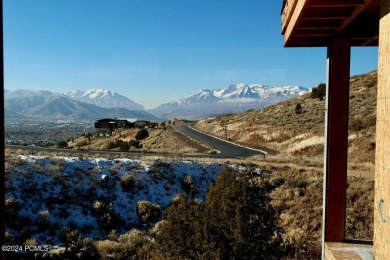 This exceptional new-construction estate, crafted for effortless on Red Ledges Golf Club in Utah - for sale on GolfHomes.com, golf home, golf lot