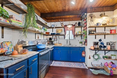 CONTEMPORARY LOG-SIDED CHALET, JUST A MINUTE OR TWO WALK TO THE on The Hideout Golf in Pennsylvania - for sale on GolfHomes.com, golf home, golf lot