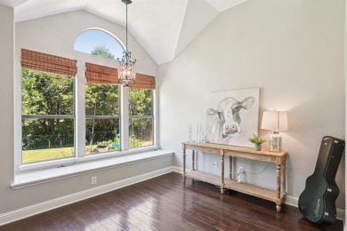 This BEAUTY is nestled on a spacious third-acre lot with a on The Shores Country Club in Texas - for sale on GolfHomes.com, golf home, golf lot