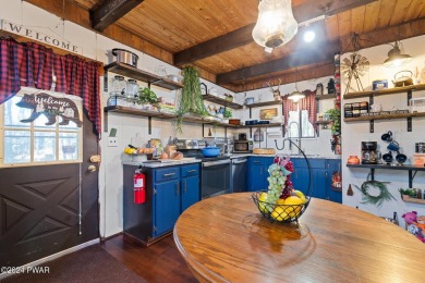 CONTEMPORARY LOG-SIDED CHALET, JUST A MINUTE OR TWO WALK TO THE on The Hideout Golf in Pennsylvania - for sale on GolfHomes.com, golf home, golf lot