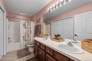 This treasured move-in ready 4-bedroom, 2.5 bathroom brick on Cracklewood Golf Club in Michigan - for sale on GolfHomes.com, golf home, golf lot