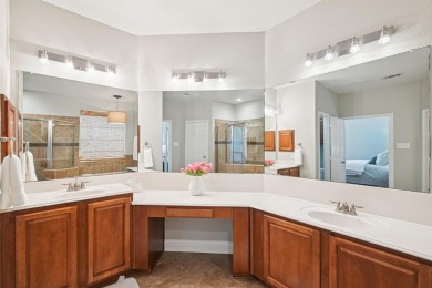 This BEAUTY is nestled on a spacious third-acre lot with a on The Shores Country Club in Texas - for sale on GolfHomes.com, golf home, golf lot