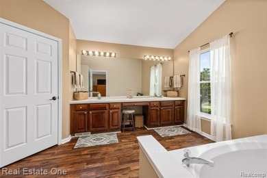 This treasured move-in ready 4-bedroom, 2.5 bathroom brick on Cracklewood Golf Club in Michigan - for sale on GolfHomes.com, golf home, golf lot