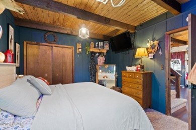 CONTEMPORARY LOG-SIDED CHALET, JUST A MINUTE OR TWO WALK TO THE on The Hideout Golf in Pennsylvania - for sale on GolfHomes.com, golf home, golf lot