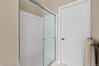 This treasured move-in ready 4-bedroom, 2.5 bathroom brick on Cracklewood Golf Club in Michigan - for sale on GolfHomes.com, golf home, golf lot