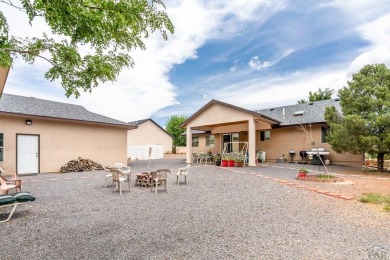 HUGE SHOP AND BONUS ROOM!! 6-Car + garage spaces!!! The HUGE on Desert Hawk At Pueblo West in Colorado - for sale on GolfHomes.com, golf home, golf lot