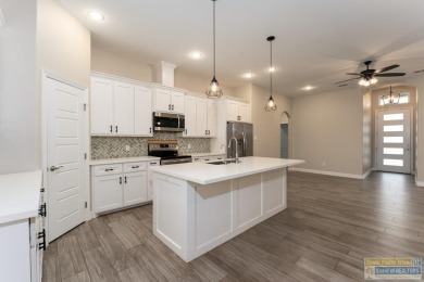 Welcome to this stunning waterfront home in the sought-after SPI on South Padre Island Golf Club in Texas - for sale on GolfHomes.com, golf home, golf lot