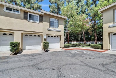 This well-maintained CORNER townhome sits in the sought-after on Tustin Ranch Golf Club in California - for sale on GolfHomes.com, golf home, golf lot