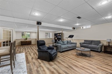 This treasured move-in ready 4-bedroom, 2.5 bathroom brick on Cracklewood Golf Club in Michigan - for sale on GolfHomes.com, golf home, golf lot