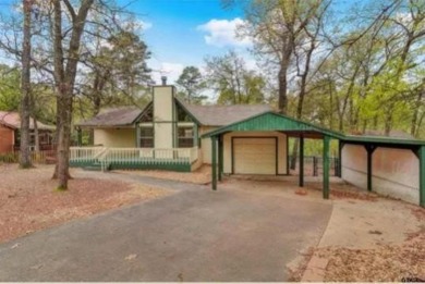 WELCOME to resort style living in the highly sought after Holly on Holly Lake Ranch Golf Club in Texas - for sale on GolfHomes.com, golf home, golf lot