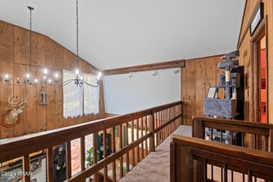 CONTEMPORARY LOG-SIDED CHALET, JUST A MINUTE OR TWO WALK TO THE on The Hideout Golf in Pennsylvania - for sale on GolfHomes.com, golf home, golf lot