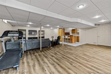 This treasured move-in ready 4-bedroom, 2.5 bathroom brick on Cracklewood Golf Club in Michigan - for sale on GolfHomes.com, golf home, golf lot