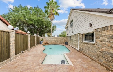 This stunning residence in Corpus Christi Country Club offers 4 on Corpus Christi Country Club Golf Course in Texas - for sale on GolfHomes.com, golf home, golf lot