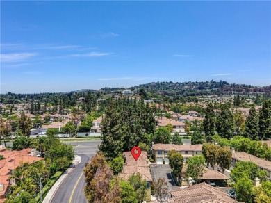 This well-maintained CORNER townhome sits in the sought-after on Tustin Ranch Golf Club in California - for sale on GolfHomes.com, golf home, golf lot