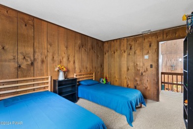 CONTEMPORARY LOG-SIDED CHALET, JUST A MINUTE OR TWO WALK TO THE on The Hideout Golf in Pennsylvania - for sale on GolfHomes.com, golf home, golf lot