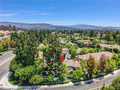 This well-maintained CORNER townhome sits in the sought-after on Tustin Ranch Golf Club in California - for sale on GolfHomes.com, golf home, golf lot