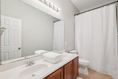 This BEAUTY is nestled on a spacious third-acre lot with a on The Shores Country Club in Texas - for sale on GolfHomes.com, golf home, golf lot
