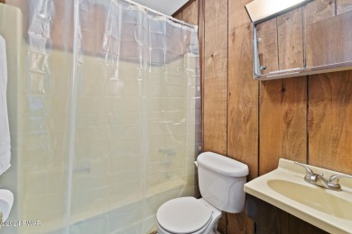 CONTEMPORARY LOG-SIDED CHALET, JUST A MINUTE OR TWO WALK TO THE on The Hideout Golf in Pennsylvania - for sale on GolfHomes.com, golf home, golf lot