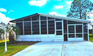 Located in a 55+ resort-style manufactured home community on on Big Cypress Golf and Country Club in Florida - for sale on GolfHomes.com, golf home, golf lot