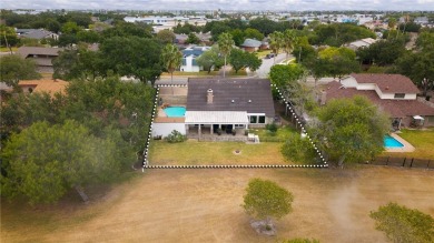This stunning residence in Corpus Christi Country Club offers 4 on Corpus Christi Country Club Golf Course in Texas - for sale on GolfHomes.com, golf home, golf lot