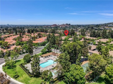 This well-maintained CORNER townhome sits in the sought-after on Tustin Ranch Golf Club in California - for sale on GolfHomes.com, golf home, golf lot